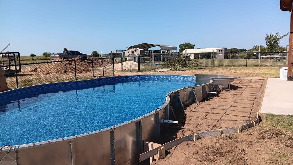 Custom vinyl liner pool installation in Tulsa, OK by Silverado Rock